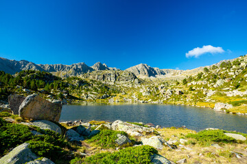 Fototapeta na wymiar Pyrenees Pessons peak and lakes in Andorra