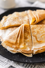pancakes with butter on a white background with ingredients flour sugar butter