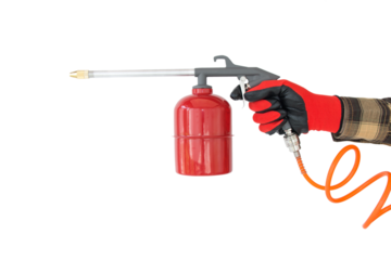 flushing gun in the hand of a worker, on an isolated background, cut out