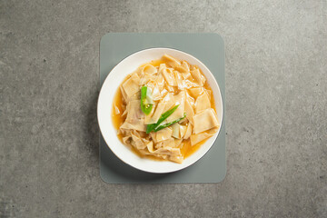 Stir-fried tofu skin on a plate