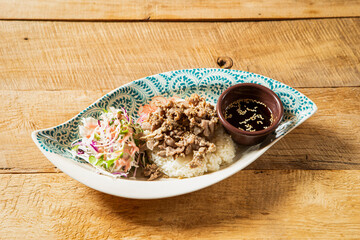 Thai-style meat stir-fry rice bowl