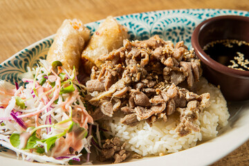 Thai-style meat stir-fry rice bowl