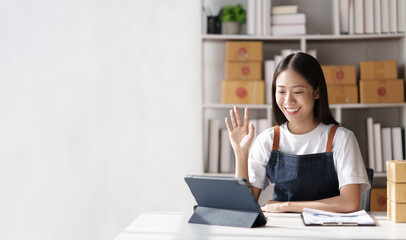 successful woman SME business with parcel boxes in her own job shopping online business at home...