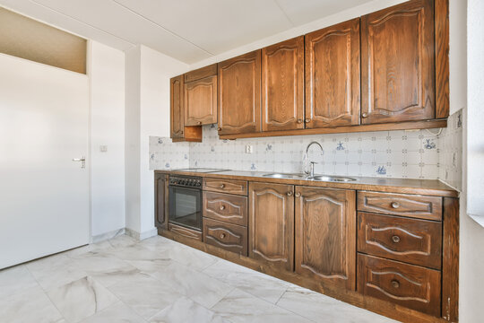 Wooden kitchen interior with cabinets