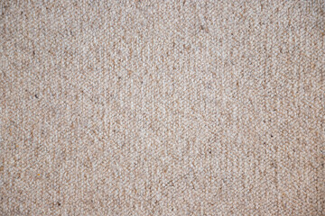 Texture of a beige carpet