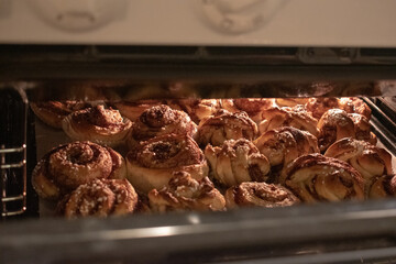 Freshly baked homemade Swedish cinnamon rolls with pearl sugar