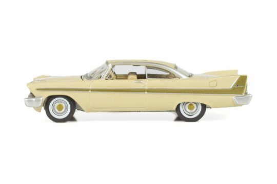 Metal model of the car in 1:64 scale. 1958 PLYMOUTH FURY. Producer AUTO WORLD, series Premium release 5 color B, issued in 2015.