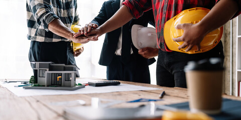 Engineer team to join hands together, accept agree cooperation and success concept