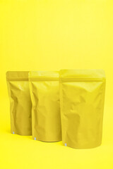 Yellow snack packaging mock-up isolated on yellow background.