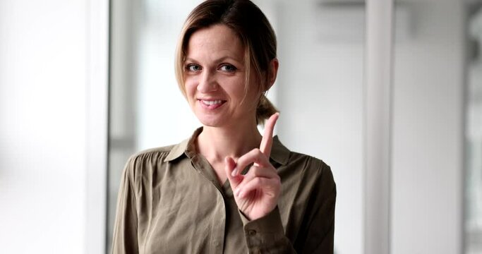 Smiling woman waving index finger and saying no 4k movie slow motion