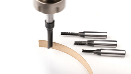 Cutting nozzles for wood for a furniture machine, on a white background