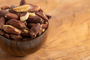 Bowl of Pili Nuts from the Philippines on a Wooden Table