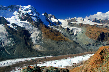 View of the snow-white Matterhorn glacier from Mount Gornergrat near Zermatt in southern...