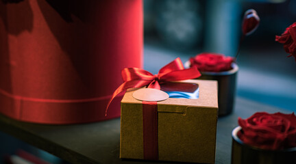 selective focus of a red color gift box with copy space, product photo