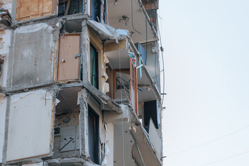 Impact on a high-rise building in the city of Dnipro, Ukraine. A residential building destroyed by an explosion after a Russian missile attack. Consequences of the explosion.