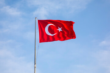 Cloudy sky and the Turkish flag