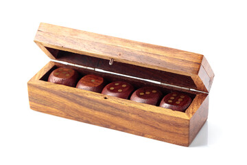 The old wooden dice isolated on a white background.