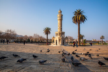 Izmir, Turkey - January 30, 2023: Izmir Clock Tower is a historic clock tower located at the Konak Square in Izmir, Turkey. Konak square is an attraction point for local and international tourist.