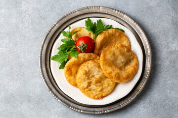 Delicious meat pie from Turkish cuisine. Fried handmade pies. Turkish name; fincan boregi or puf borek