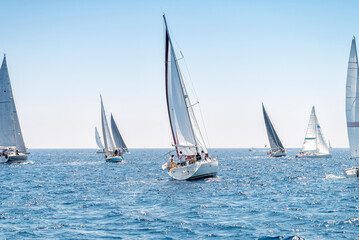 Group of yacht sailing at regatta