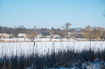 landscape with snow covered house in Ukraine