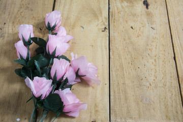 flowers on wooden background