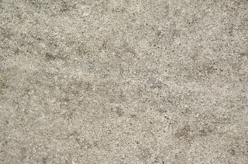 Close up of scratched and peeling white paint old wall surface, concept for abstract background and grunge texture, concrete surface pattern is damaged from aged and dampness, material crack vintage