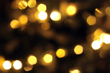 Colorful bokeh, defocused christmas tree, xmas background. Blurred bright light. Circle dots.