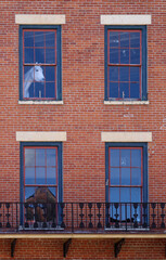 Fototapeta na wymiar Horse on the second floor of the building