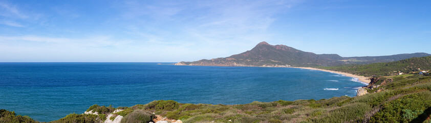Fototapeta na wymiar Landscape on the Sea Coast of Sardinia, Italy. Sunny Fall Season Day. Panorama