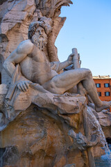 17th century Fountain of the Four Rivers located in Piazza Navona, Rome, Italy.