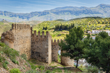 Fototapeta na wymiar Fortress wall near Alcazaba citadel. Antequera, Malaga province, Andalusia, Spain.