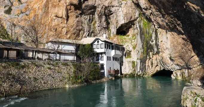 Aerial drone view of Tekija in Blagaj in BiH. The Tekija, dervish house, set at the source of the river Buna, was and still is a venue for dervish Zikr praise-chanting three nights weekly.