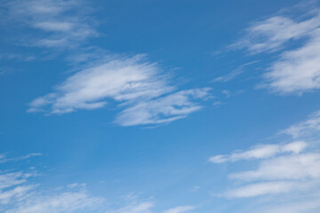 White clouds in a clear blue sky
