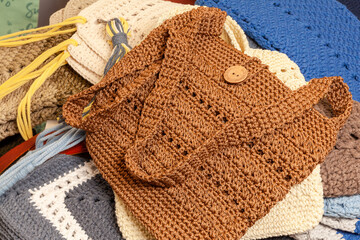 Crocheted messenger bag pattern and collage of other handmade items.