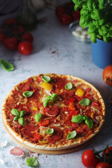 Pizza with salami and basil	
