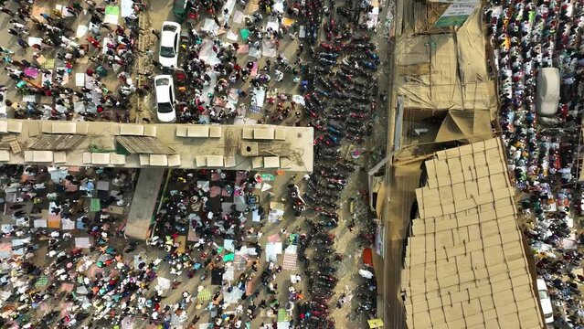 Dhaka, Bangladesh - 20 January 2023: Aerial view of people worshipping at Global Muslims Congregation in Tongi, Dhaka, Bangladesh.