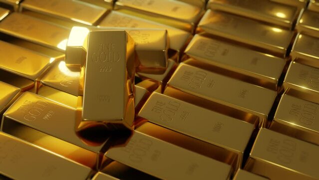 A close up of gold bars on a very large stack
