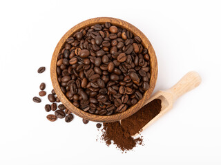 Bowl of ground coffee and beans isolated on white background. Coffee in wooden spoons.