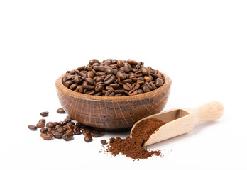 Bowl of ground coffee and beans isolated on white background. Coffee in wooden spoons.