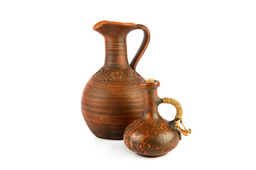 Ceramic amphora and small jug isolated on white background.