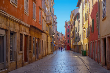 Streets of Rovinj with calm, colorful building facades, Istria, Rovinj is a tourist destination on Adriatic coast of Croatia - 570047043