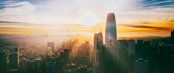 Sunrise over the city San Francisco with ray of sunlight sunray and hope to start business...