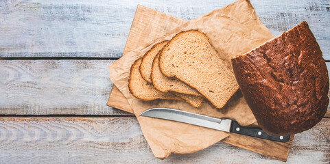 Fototapeta na wymiar Bread. Food. Homemade bread food. Slices of bread food. Nutritious food. Artisan bread with seeds.Rustic sourdough bread