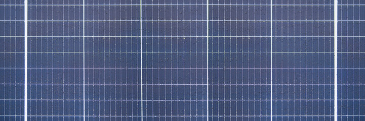 Solar panel texture with raindrops, waterproof solar panel modules, top view, as background or...