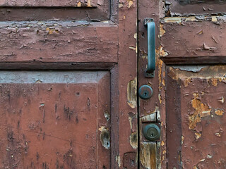 Rusty scraped wooden door