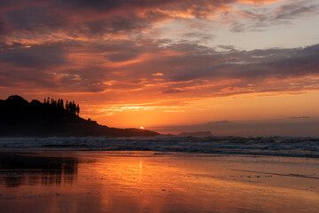 Fototapeta na wymiar Sunrise at Joaquina beach in Florianópolis Brazil