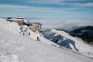 Beautiful winter scenery of Kasprowy Wierch Peak in Tatras Mountains, famous place in Tatras with cable railway. Poland. Tatra National Park