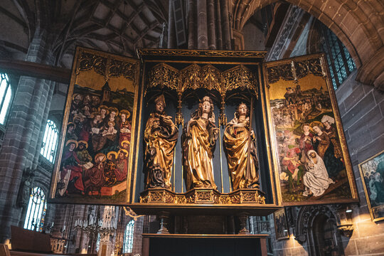 Statues of saints and icons in the ancient Coatolic Gothic Cathedral of Nuremberg, Germany