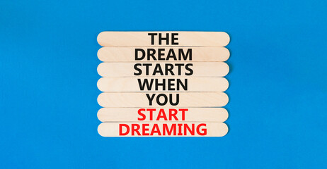 Start dreaming symbol. Concept words The dream starts when you start dreaming on wooden stick....